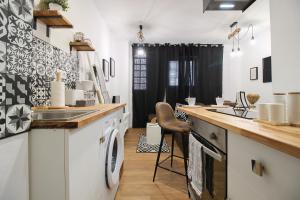 Dapur atau dapur kecil di Apartamentos Rios