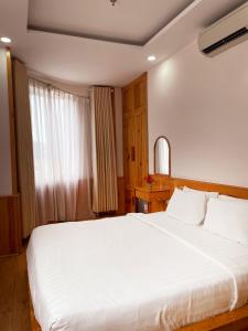 Postel nebo postele na pokoji v ubytování MDHOTEL 2