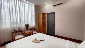 Postel nebo postele na pokoji v ubytování MDHOTEL 2