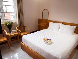 Postel nebo postele na pokoji v ubytování MDHOTEL 2