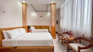 Postel nebo postele na pokoji v ubytování MDHOTEL 2