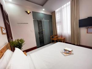 Postel nebo postele na pokoji v ubytování MDHOTEL 2