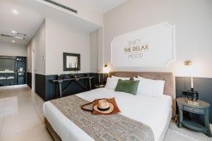 Postel nebo postele na pokoji v ubytování The Mood Luxury Rooms + 37 fotografií