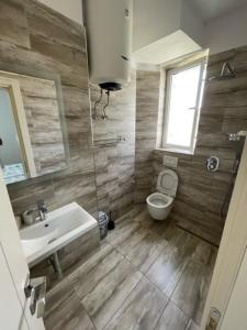 Foto Tiranas asuva majutusasutuse New Bazaar Rooms galeriist