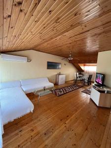 Postel nebo postele na pokoji v ubytování Апартаменти за гости
