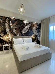 Postel nebo postele na pokoji v ubytování Suite 55 in centro + 22 fotografií