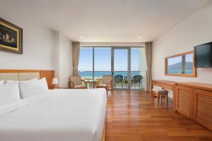 Postelja oz. postelje v sobi nastanitve Sekong Hotel Da Nang
