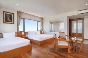 Postelja oz. postelje v sobi nastanitve Sekong Hotel Da Nang