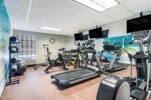 a gym with several treadmills and exercise bikes at Clarion Pointe South Boston-Danville East in South Boston