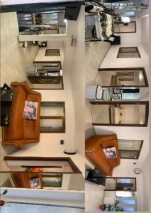 a room with a wall with several beds at Casa samo in Vama Veche