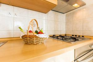 Kuchyň nebo kuchyňský kout v ubytování Apartments Villa Mirella