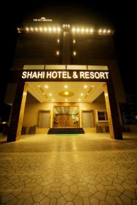 a building with a sign that reads shitzh hotel and resort at The Sky Imperial - Shahi Hotels & Resort in Nāthdwāra