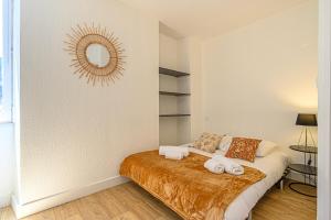 Posteľ alebo postele v izbe v ubytovaní LE BERDER - Appartement T3 centre ville Sarzeau