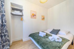 Posteľ alebo postele v izbe v ubytovaní LE BERDER - Appartement T3 centre ville Sarzeau