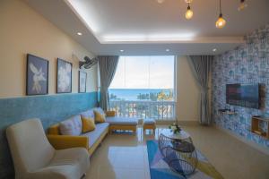 Телевизор и/или развлекательный центр в Vung tau seaview apartment 2 - Oasky Son Thinh - villahomestayvungtau