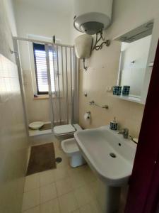 Ein Badezimmer in der Unterkunft Casa di Rossella