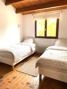 Postel nebo postele na pokoji v ubytování Magnifique villa avec piscine à La Palmyre