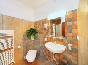Kúpeľňa v ubytovaní tx HOTEL