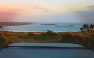 a view of the ocean from the top of a house at Sea View Snugs at Laggan in Gatehouse of Fleet