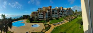 Basen w obiekcie WIFI Los Cisnes 2 dormitorios Primera Linea playa Ayamonte Isla Canela lub w pobliżu