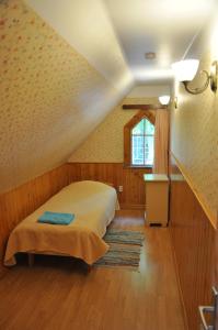 Postel nebo postele na pokoji v ubytování Tiia Guesthouse