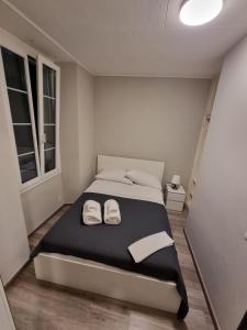 Letto o letti in una camera di Osteria Pozzo