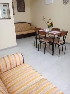 A seating area at L 'Alcova Holidays Home CENTRO STORICO