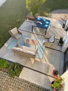 an aerial view of a patio with a table and chairs at Chez Moon in Tiffauges