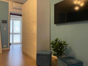 Televízia a/alebo spoločenská miestnosť v ubytovaní Sogno in Cittadella