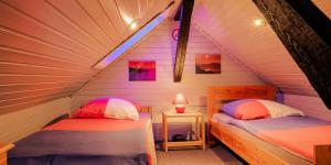 Tempat tidur dalam kamar di Appartement zur Rosi