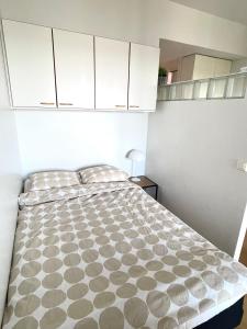 Postel nebo postele na pokoji v ubytování Pohjanpuistikko Apartment