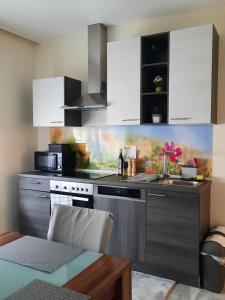 Kuchnia lub aneks kuchenny w obiekcie Ferienhaus Lina