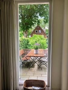 Balkón nebo terasa v ubytování HOLTINGERHUYS Uffelte- Giethoorn! Tegen betaling Wellness!!!