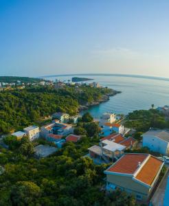 an aerial view of a small town next to the water at Vila Seknič in Utjeha