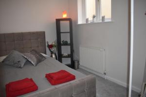 Postel nebo postele na pokoji v ubytování Starlight Cottage Room Only In Glastonbury + 11 fotografií