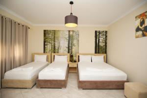Postel nebo postele na pokoji v ubytování Hotel Summer Stars