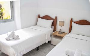 Cama ou camas em um quarto em Señor Polo, La Punta.