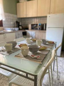 Kuchyň nebo kuchyňský kout v ubytování THEODORAS HOUSE