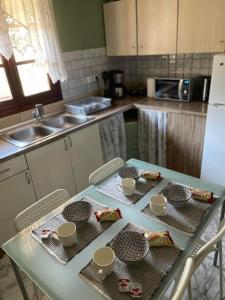 Kuchyň nebo kuchyňský kout v ubytování THEODORAS HOUSE