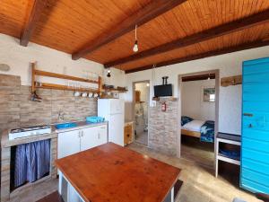 A cozinha ou kitchenette de Robinson house Ruža