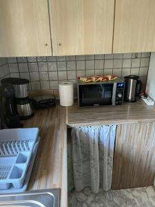 Kuchyň nebo kuchyňský kout v ubytování THEODORAS HOUSE