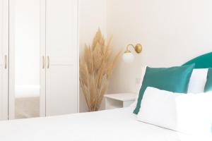 Postel nebo postele na pokoji v ubytování Lux Aurea