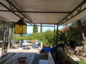 Foto dalla galleria di Cottage Pura Vigna immerso nella natura vicino al mare a Porto Santo Stefano Altre 52 foto