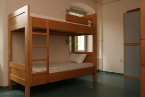 Llit o llits en una habitació de HI Hostel Rijeka
