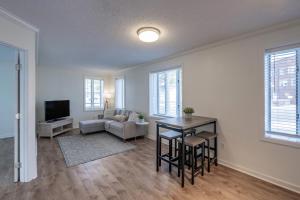 a living room with a couch and a table at The Forum in Ocean City