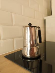 Příslušenství pro přípravu čaje a kávy v ubytování La Nogalera