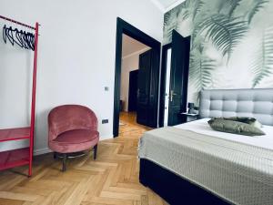 Postel nebo postele na pokoji v ubytování Yacht Club Residence