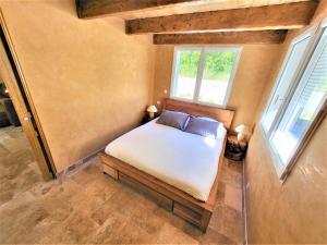 Łóżko lub łóżka w pokoju w obiekcie Villa avec piscine chauffée à l'année(Verdon/Golf)