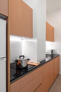 A kitchen or kitchenette at LOFT DESIGN GRANADA CENTER 2min CATHEDRAL FREE WIFI