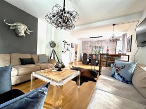 Część wypoczynkowa w obiekcie STADTVILLA BELLE KITZ im Zentrum mit Sauna by Belle Stay